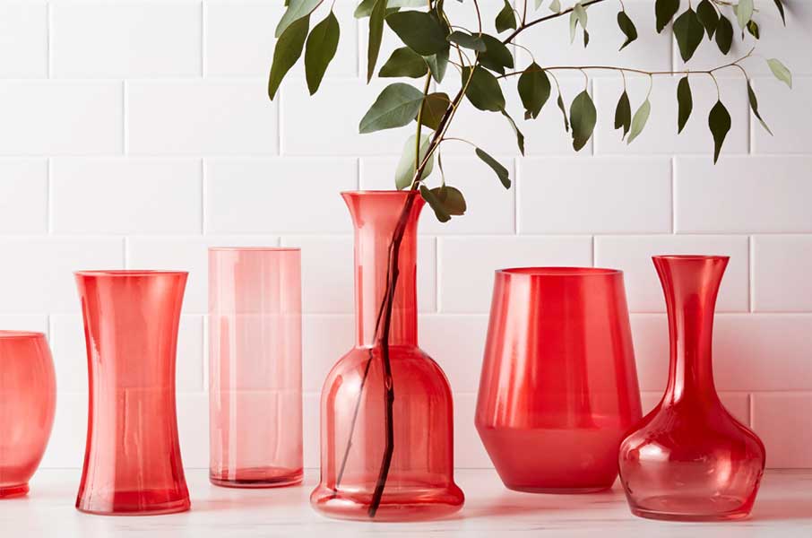 assortment of red stained glass vases